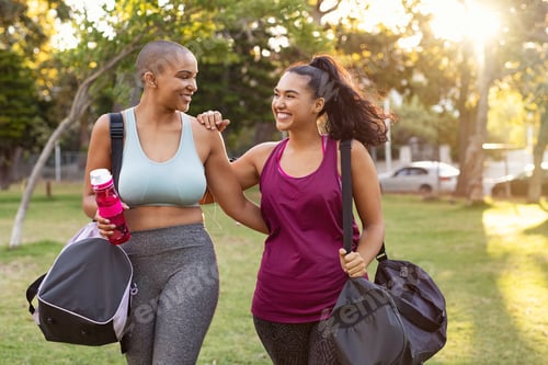 Preview: Two Women Chatting after Workout in the Park