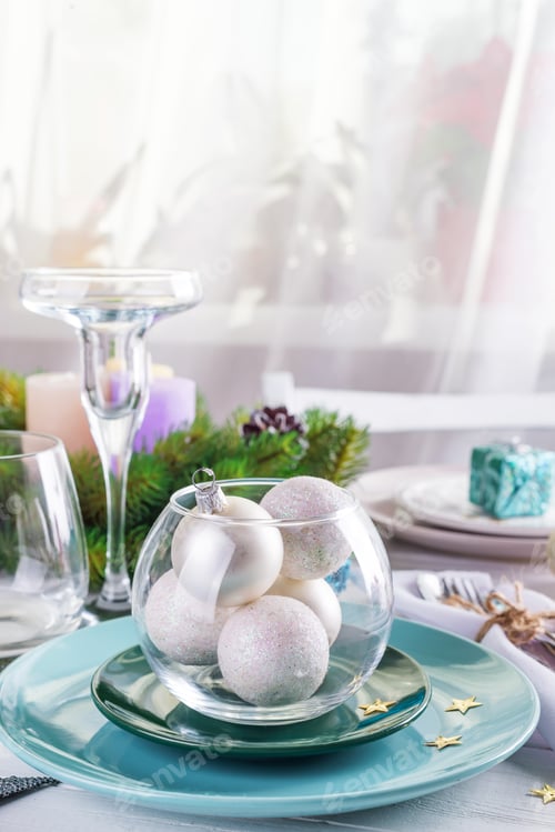 Preview: Place table setting for Christmas white table with blue and silver decor elements with green