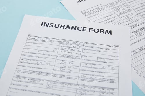 Preview: close-up view of insurance form on blue, insurance concept
