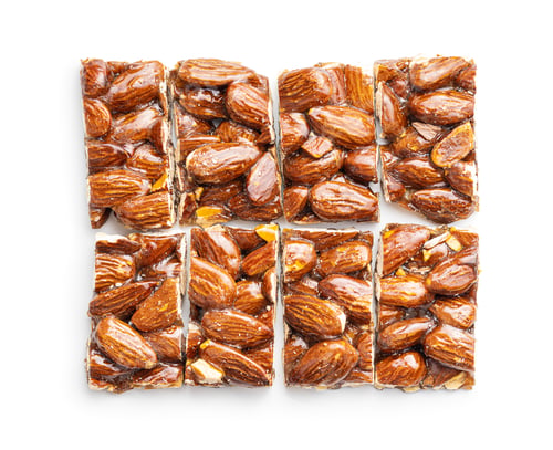 Preview: Sweet mini almond bars isolated on white background.