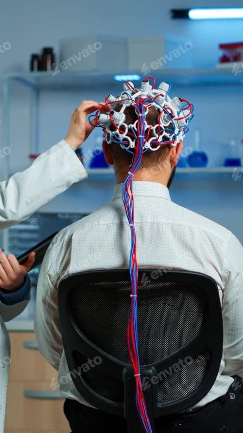 Preview: Man wearing performant eeg headset scanning brain electrical activity
