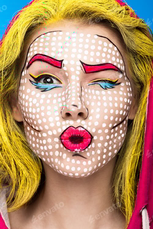 Preview: Photo of surprised young woman with professional comic pop art make-up and design manicure.