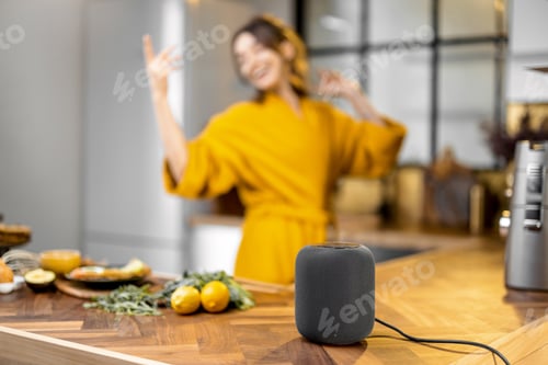 Preview: Woman dancing on the kitchen during a breakfast time