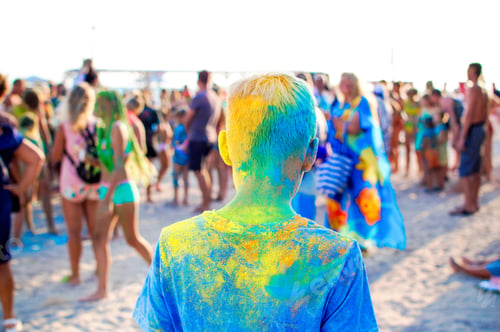 Preview: Young teenager at the festival of colors. Holi Indian Colors Festival. Digital detox, lifestyle, out