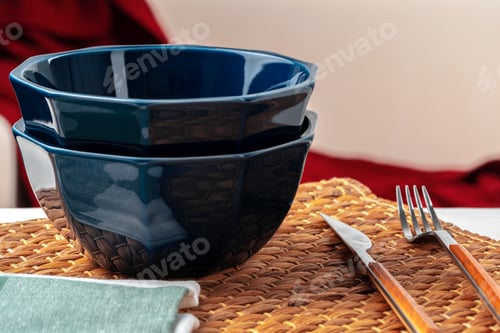 Preview: Empty blue ceramic bowl on kitchen table
