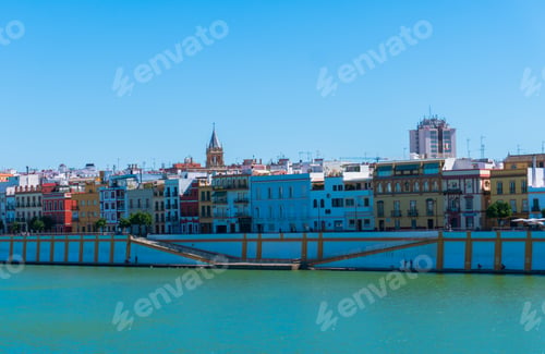 Preview: Beautiful view of a cityscape by the river in Seville, Spain