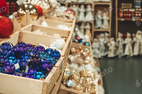 Preview: Shiny Christmas Ornaments Displayed in Wooden Crates