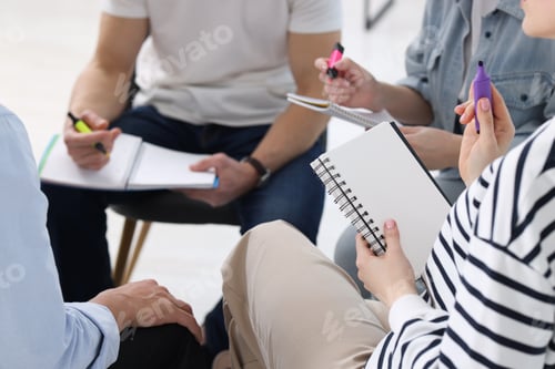 Preview: Group of people having meeting during life coaching class indoors, closeup