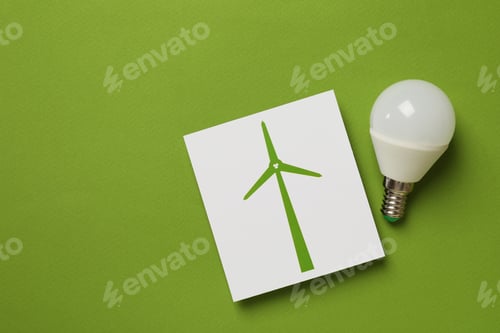 Preview: Saving electricity concept on green background, space for text