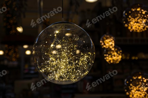 Preview: bokeh background met lighted chtismas balls