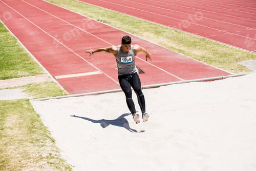 Preview: Athlete performing a long jump