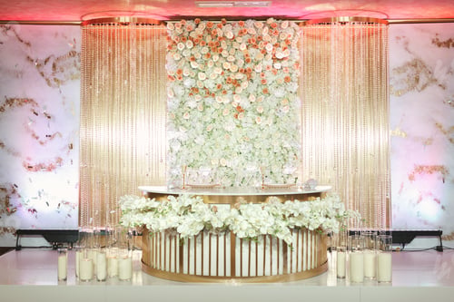 Preview: A luxurious table for the bride and groom at the wedding with flowers and candles