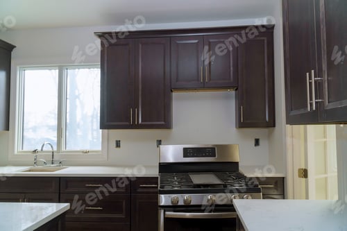 Preview: Installed kitchen wooden cabinets with a view of home improvement in a set of furniture