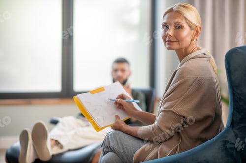 Preview: Blonde-haired experienced psychoanalyst working all day long