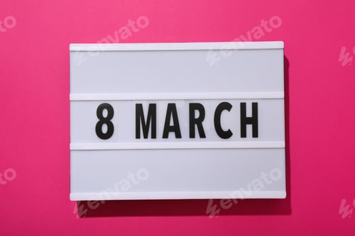 Preview: A white sign with the inscription March 8