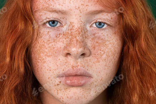 Preview: Portrait of a red-haired girl with freckles