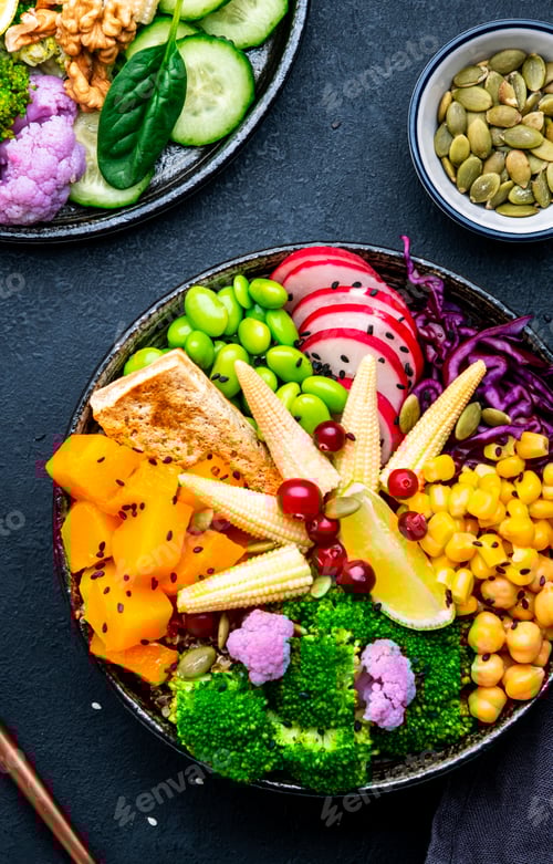 Preview: Vegan buddha bowl with sweet potato, quinoa, chickpeas, soybeans edamame, tofu, corn, broccoli