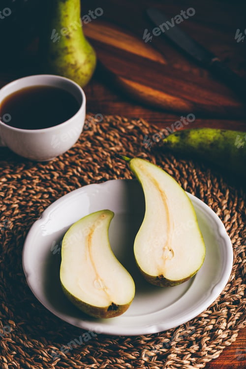 Preview: Halved Conference Pear on Plate