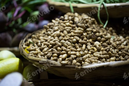 Preview: A basket of peanuts at a street market, Mauritius