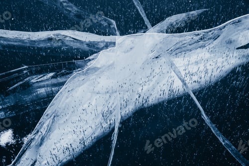 Preview: Amazing patterns of cracks on the frozen ice of Lake Baikal in winter.