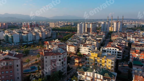 Preview: Aerial view of urban landscape with view of multi-storey colored houses.