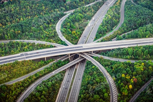 Preview: Aerial view of intersecting highways near trees, London, England