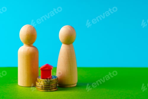 Preview: Wooden Figures with House on Stack of Coins