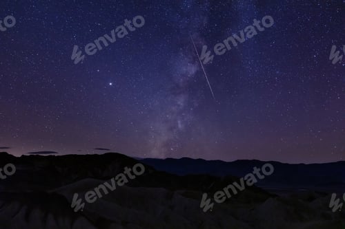 Preview: Zabriskie point death valley with the milky way and shooting star
