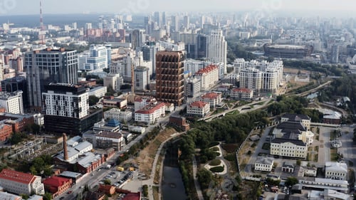 Preview: Urban aerial view of the morning in big modern city, summer haze. Stock footage. Beautiful big city