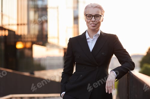 Preview: Mature businesswoman in suit
