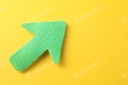 Preview: One green arrow on yellow background, top view. Space for text