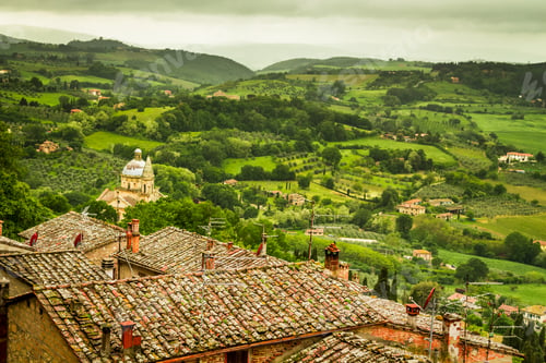 Preview: Green valley and red roofs in Volterra, Italy