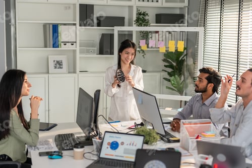 Preview: Group of Asian businessman and businesswoman working in the office.