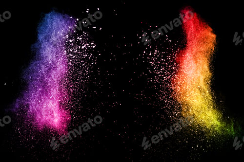 Preview: Multi color powder explosion on black background. Launched colorful dust particles splash.