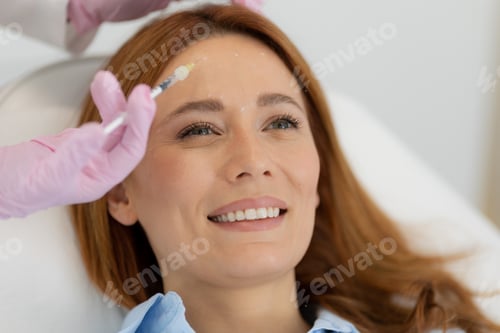 Preview: Enhancing beauty with dermal filler therapy in a serene clinic environment during a sunny afternoon