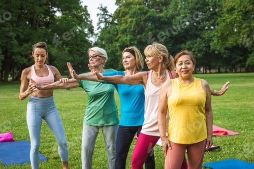 Preview: Senior women training with fitness coach at park