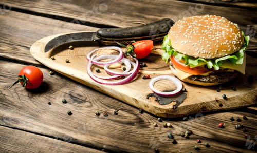 Preview: Cooked Burger with vegetables, cheese and meat.