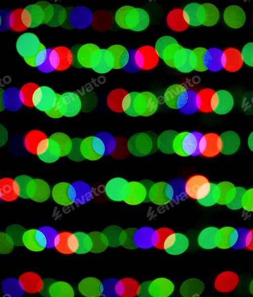 Preview: Bokeh Circles Of Different Colors Of Light On A Black Background