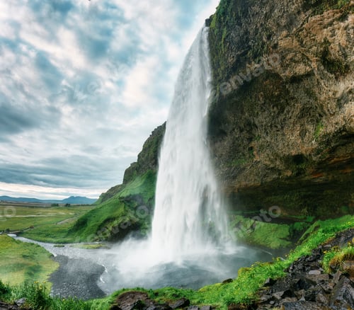 Preview: Moody of Seljalandsfoss waterfall flowing in summer at Iceland