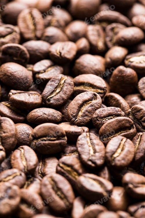 Preview: Roasted coffee beans top view, closeup image, space for text