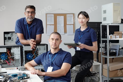 Preview: Group of IT Professionals Working on Computers in Office