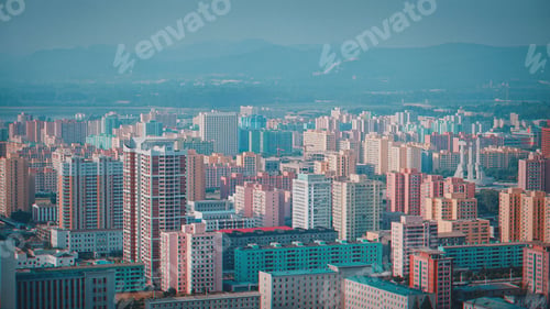 Preview: Drone view of a cityscape with skyscrapers and residential buildings in North Korea