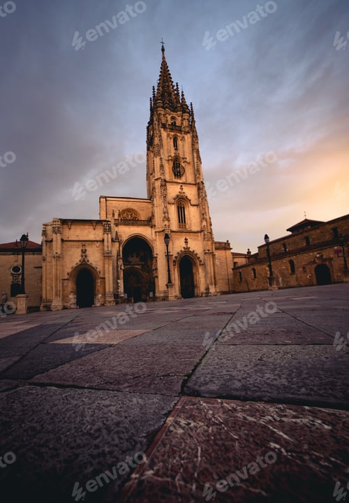 Preview: Old cathedral near hills and blue sky