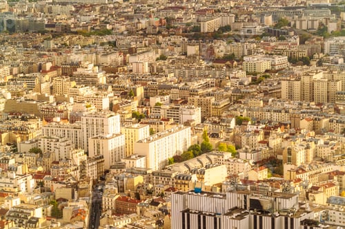 Preview: Aerial view of a dense European city of Paris with closely packed buildings and streets
