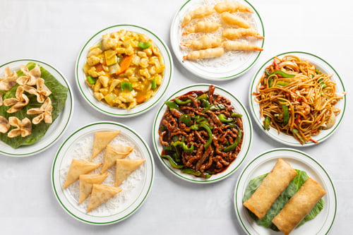 Preview: Chinese food on a white tablecloth table