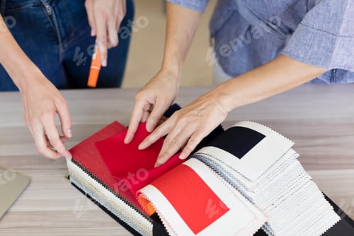 Preview: Colleagues working with fabric swatches