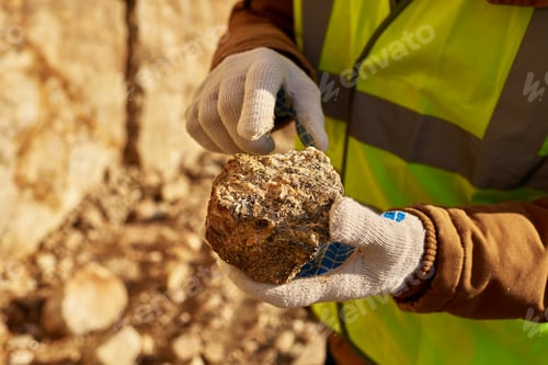 Preview: Miner Holding Chunk of Mineral