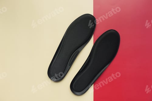 Preview: top view of Orthopedic insoles on color background