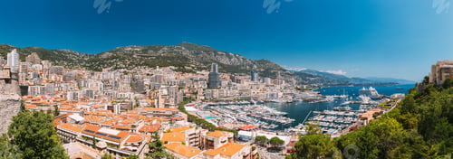 Preview: Monaco, Monte Carlo cityscape. Real estate architecture on mountain hill background. Many high-rise