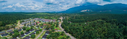 Preview: Aerial drone view of oil palm plantations near rural settlements in Asahan, Melaka, Malaysia.